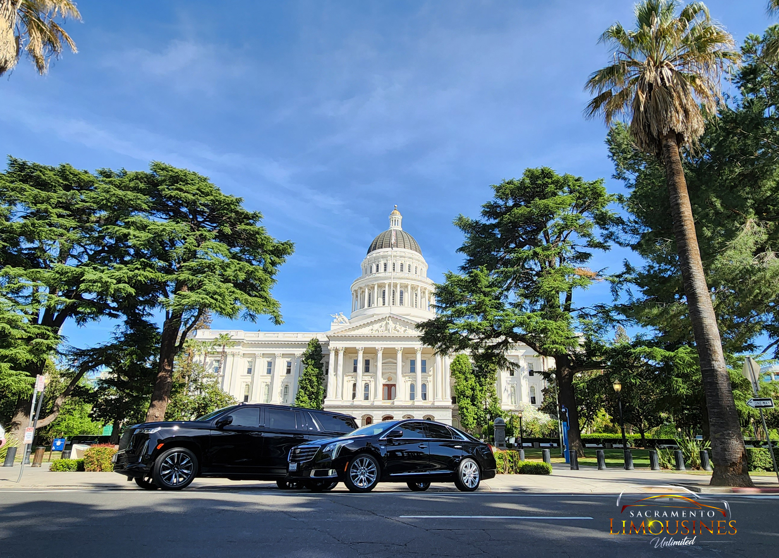 Group_SUV_Escalade_Sedan_Xtsl_Downtown_Capitol_outfront_Centered